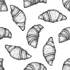 Seamless pattern with black and white croissants and bread