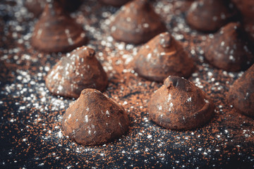 chocolate truffles on slate tray