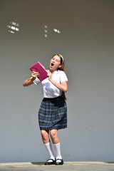 Stressed Cute Colombian School Girl While Standing