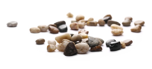 Colorful decorative pebbles, rocks isolated on white background