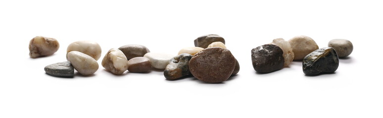 Colorful decorative pebbles, rocks isolated on white background