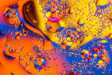 Abstract background with colorful gradient colors. Oil drops in water abstract psychedelic pattern...