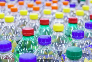 Image of many plastic bottles with water in a shop