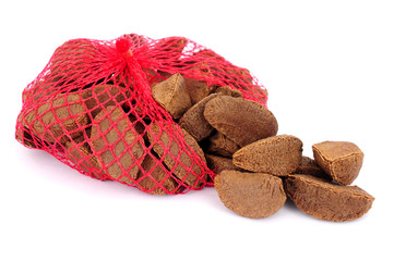 Brazil nuts in red string bag packaging