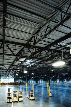 Forklifts in warehouse