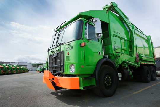 Garbage Truck Parked In A Parking Lot
