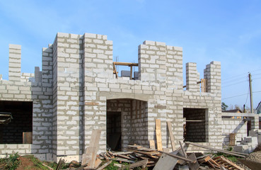 exterior of a country house under construction. Site on which the walls are built of gas concrete...