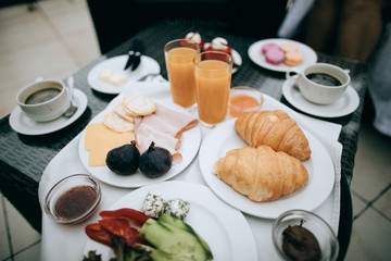 breakfast with croissants and coffee