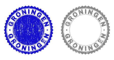Grunge GRONINGEN stamp seals isolated on a white background. Rosette seals with grunge texture in blue and grey colors. Vector rubber stamp imprint of GRONINGEN text inside round rosette.