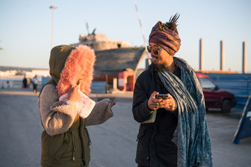 Young Asian Bearded Tourist man with Dreadlocks and scarf on head Having Fun in Essaouira, Morocco...