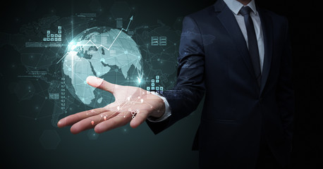 Businessman handing transparent global information flow concept on his hand