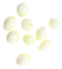 Peeled onions on a white background