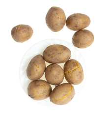 Boiled potatoes in a plate isolated on white background