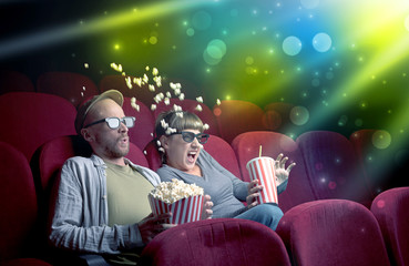 Fanciful couple watching miraculous part of a movie