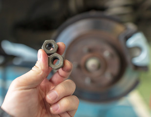 Bolts from the car in the workshop