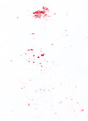 Red blood on white snow as a background