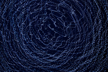 Blue lights in motion at night as an abstract background