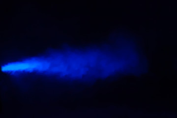 Blue colorful smoke on a black background