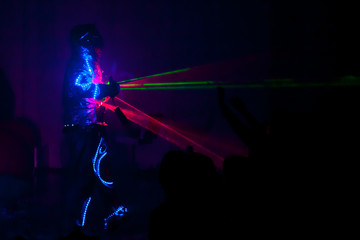 Colorful lights show. Laser show in motion in dark