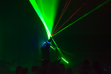 Colorful lights show. Laser show in motion in dark