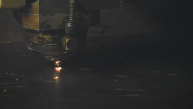 Industrial laser sheet metal cutting process.