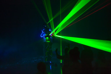 Obraz premium Colorful lights show. Laser show in motion in dark