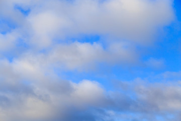 Clouds after rain before sunset as a background