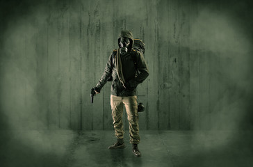 Dreadful dangerous man with wood, shanty wallpaper and fume around
