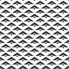 Vector seamless pattern of triangles and dots.