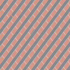 Abstract seamless pattern of short diagonal stripes.