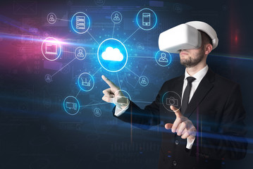 Businessman in vr glasses organize lifesize projected social media concept
