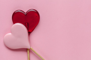 Fototapeta premium Valentine day background with hearts. Pink background. Top view