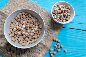 Chickpeas soaked in water in a bowl