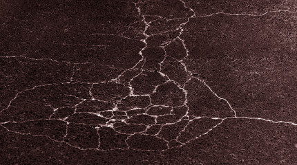 Abstract cracked background as basis for any creative design. Cement, asphalt floor fissure...