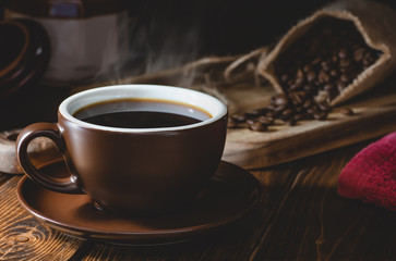 Steaming Cup of Coffee in a Dark Setting
