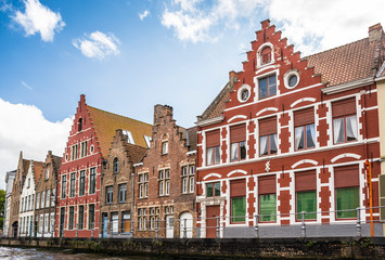 Naklejka premium Beautiful canal and traditional houses in the old town of Bruges (Brugge), Belgium