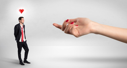 Foolish blind businessman in love going after big naked hand
