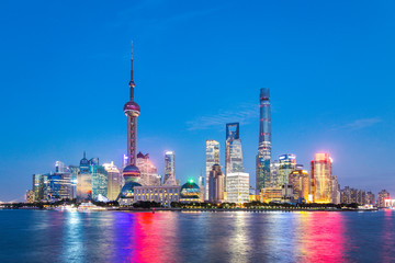 Obraz premium Night Scenery of International Metropolis, Urban Skyline of Seaside