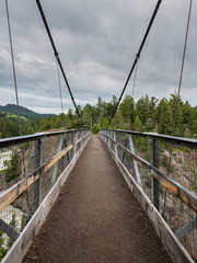 Crossing Suspension Bridge on Overcast Day
