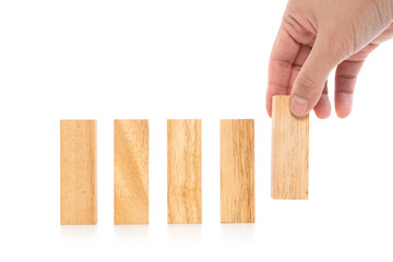 Business concept growth success process,woman hand stacking wooden blocks