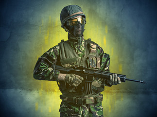 Hazard, menace soldier in a ruined crumbly building with arms on his hand
