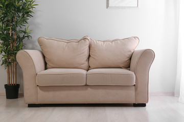 Interior of modern room with comfortable sofa