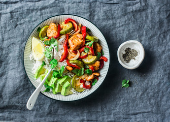 Sheet pan chicken and vegetables rice bowl - delicious diet balanced lunch on a grey background, top view