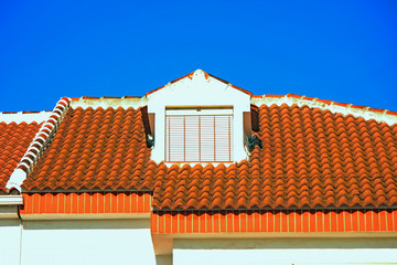 Attic window in tiled roof