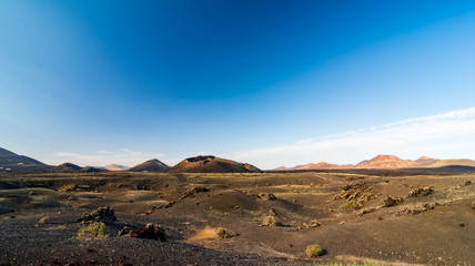 Fototapeta na wymiar Beautiful landscape with volcano El Cuervo in Lanzarote, Canary Islands in Spain.