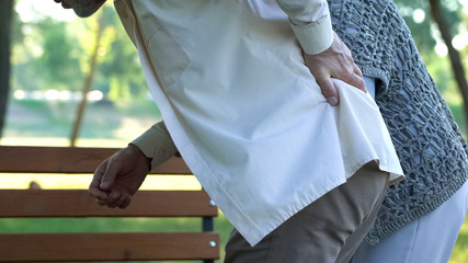 Vertebral hernia, pensioner suffering spine problems caring wife support husband