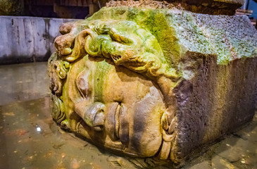 The Column with inverted Medusa head base in Basilica Cistern. Istanbul. Turkey