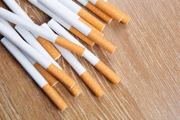 Cigarettes on a wooden background