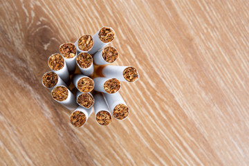 Cigarettes on a wooden background