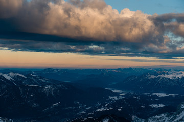 Beautiful sunset and clouds over the Zugspitze mountains in Bavarian Alps, Germany